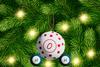 A Christmas bauble in the shape of a water molecule