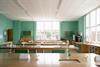 An image showing an empty science classroom, with benches, sinks, sockets and gas taps,, stool on benches